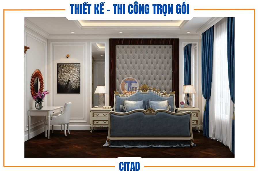 Phòng ngủ với đầu giường bọc da sang trọng và đèn bàn hai bên.